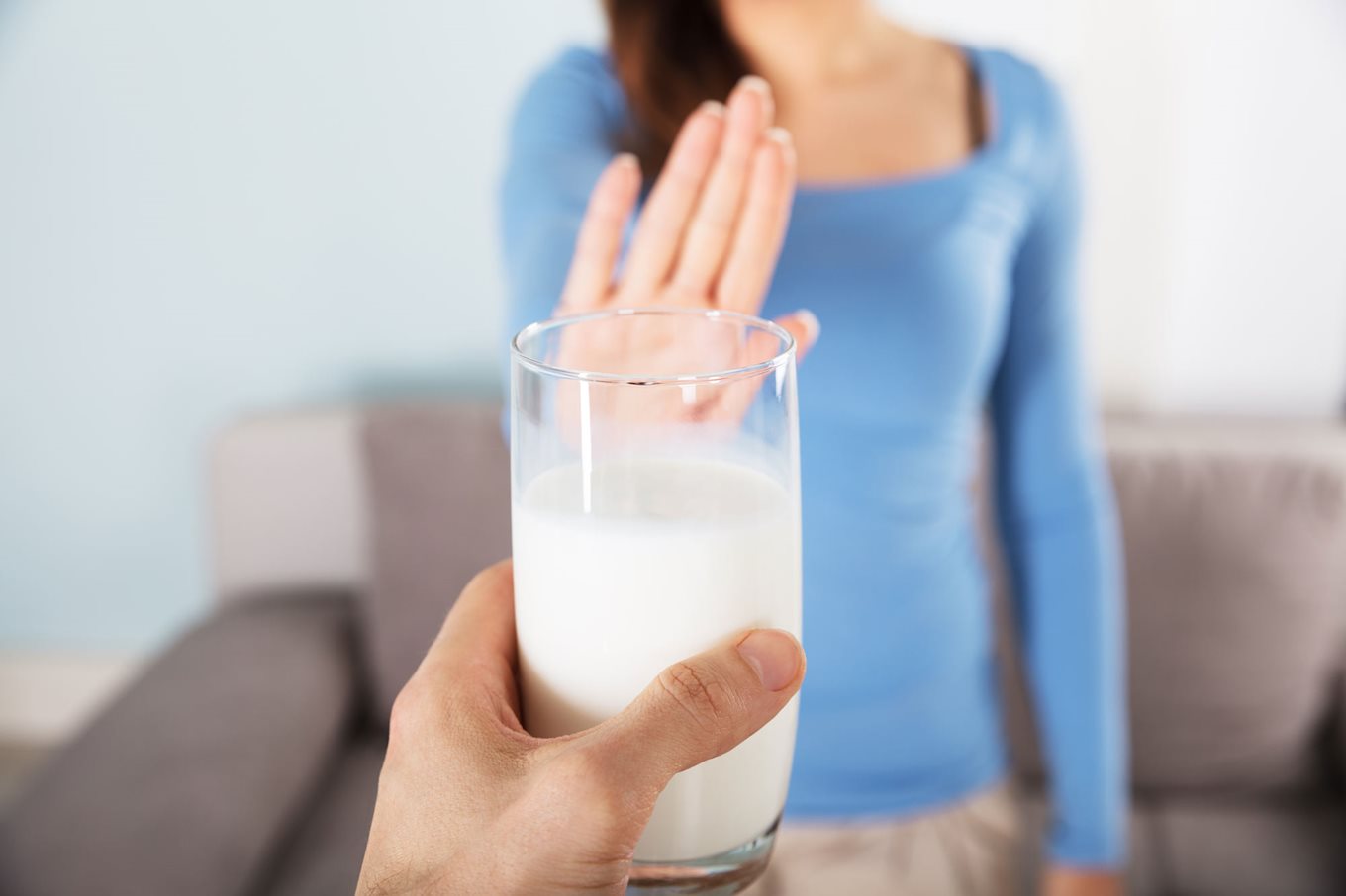 Woman refuses glass of milk