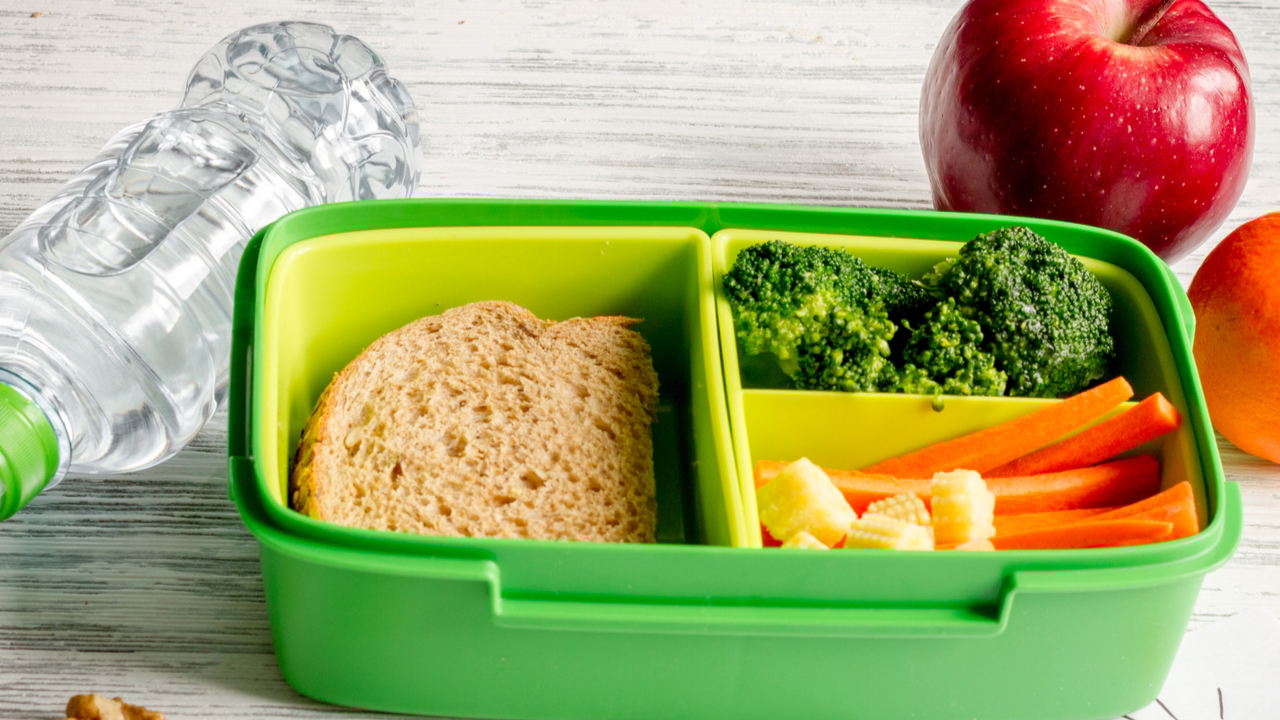 lunchbox with wholegrain sandwich and vegetable sticks